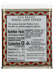 Sun Brand Madras Curry Powder cooking dish with steaming, flavorful meal.