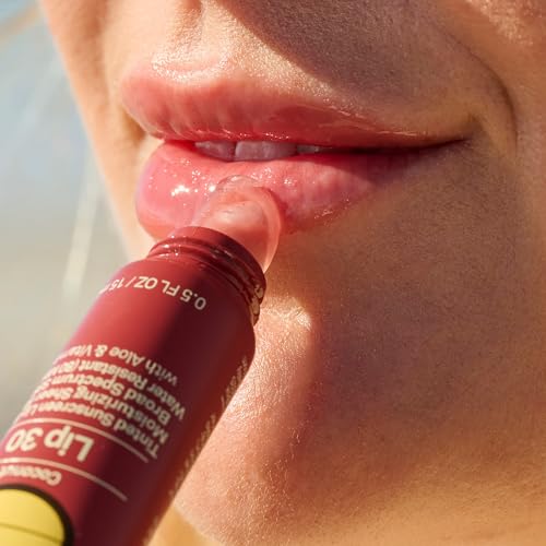 Sun Bum Aloe and Vitamin E essence supporting hydration and nourishing lip care.