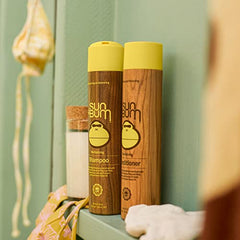 Sun Bum curl waves texture closeup demonstrates frizz control and shine in natural light.
