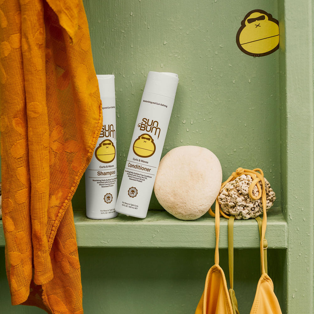 Sun Bum Curls Conditioner sun-protection banner indicates UV shielding.