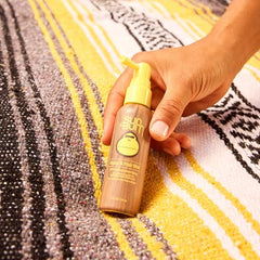 Travel-sized Sun Bum SPF 30 mist for quick scalp protection.