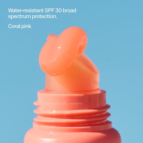 Sun Bum Sunset Cove tinted lip balm with SPF 30 close-up for protection and color.