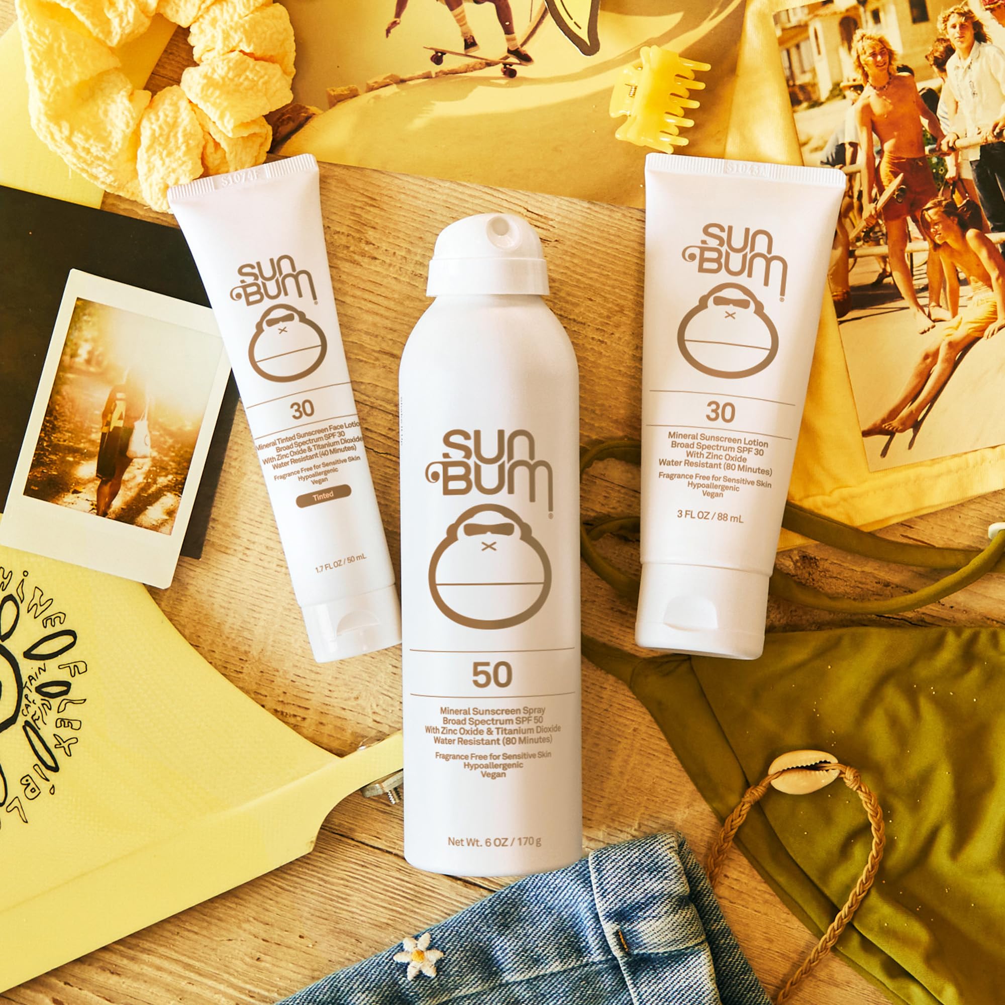 Travel-size Sun Bum sunscreen bottle tucked into a bag for travel.