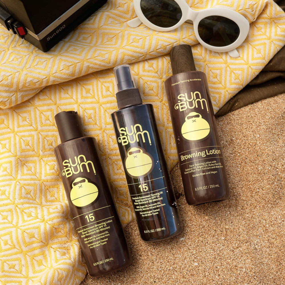Ingredients close-up highlighting Argan, Coconut, and Avocado oils in Sun Bum Browning Lotion.