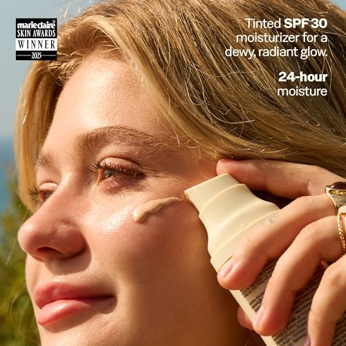 Sun Bum Daily Glow SPF 30 bottle photographed for travel-ready protection.