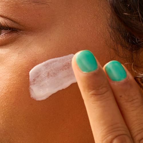 Sun Bum lotion being applied, spreads easily with a light, non-greasy feel.