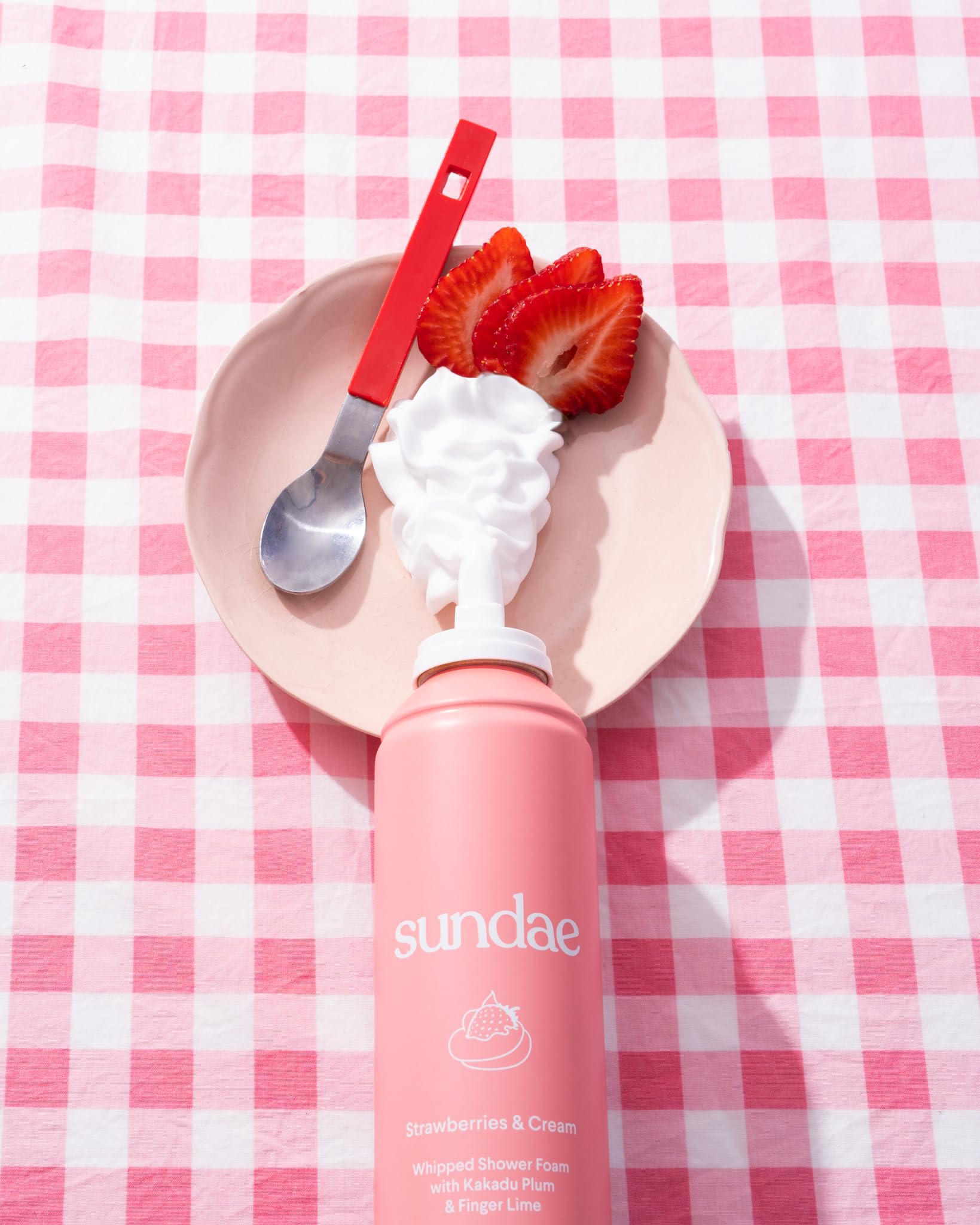 Sundae strawberries-cream-foam-lather-closeup reveals creamy foam and vibrant scent.