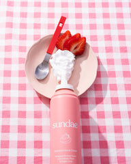 Sundae strawberries-cream-foam-lather-closeup reveals creamy foam and vibrant scent.