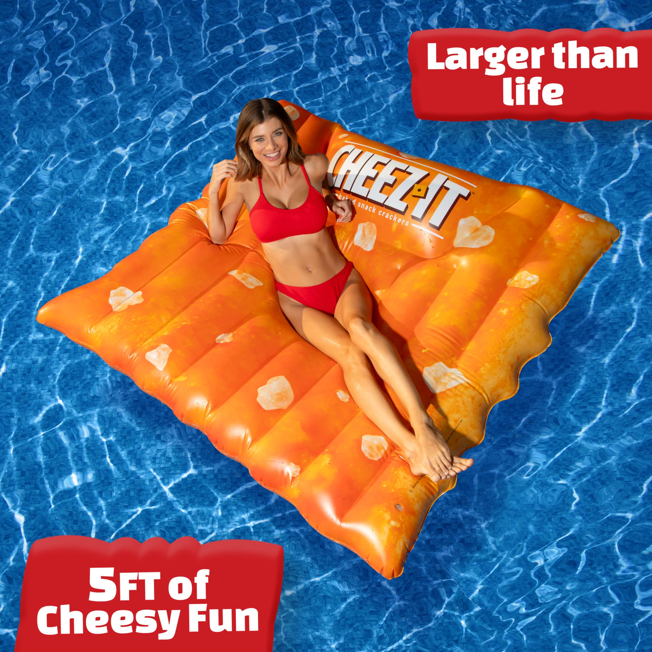 Sunny Days Giant Cheez-It Pool Float lounging pose, ideal for relaxed sunbathing and social media snaps.