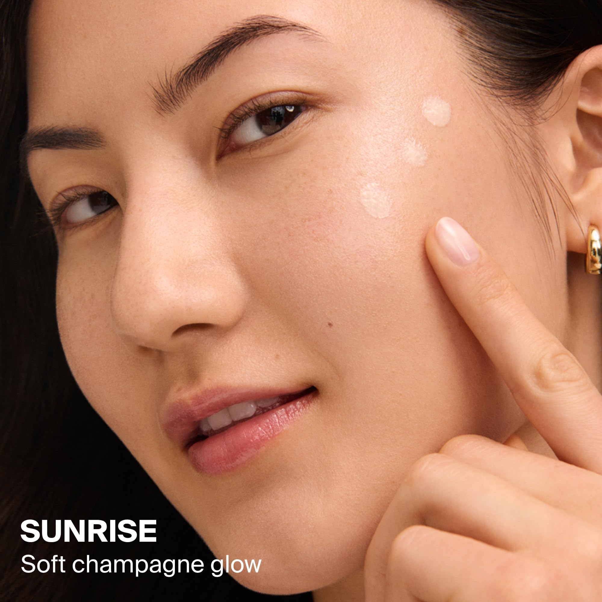 Close-up of hydration in Supergoop Glowscreen Drops Sunrise with strawberry oil benefits.