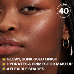 Dewy finish close-up with champagne glow and light texture.