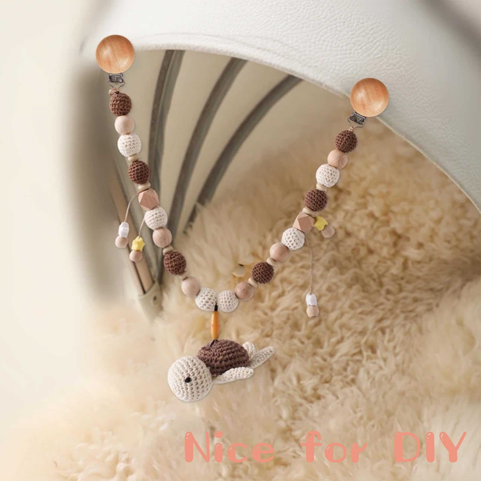 Suptizizkz pacifier clip attached to baby clothes for safety.