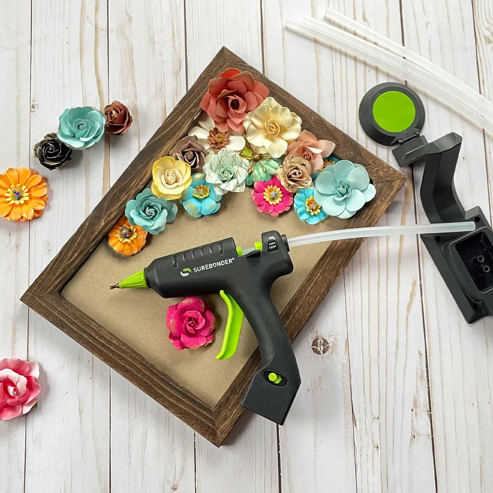 Compact, travel-friendly Surebonder CL-195F glue gun for on-the-go crafting.