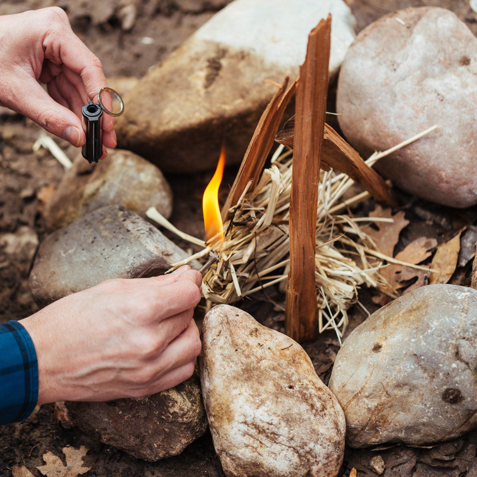 Action shot showing the fire starter igniting quickly outdoors.