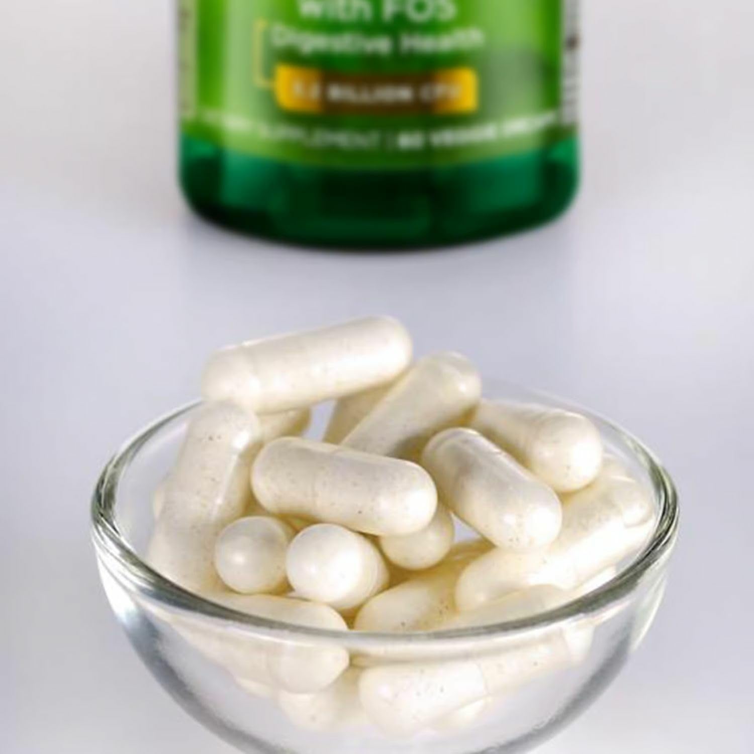 Close-up of Swanson probiotic label showing 16 strains and prebiotic FOS