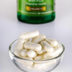 Close-up of Swanson probiotic label showing 16 strains and prebiotic FOS