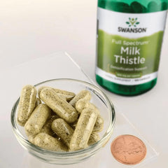 Swanson full spectrum milk thistle label shows ingredients and dosage guidance.