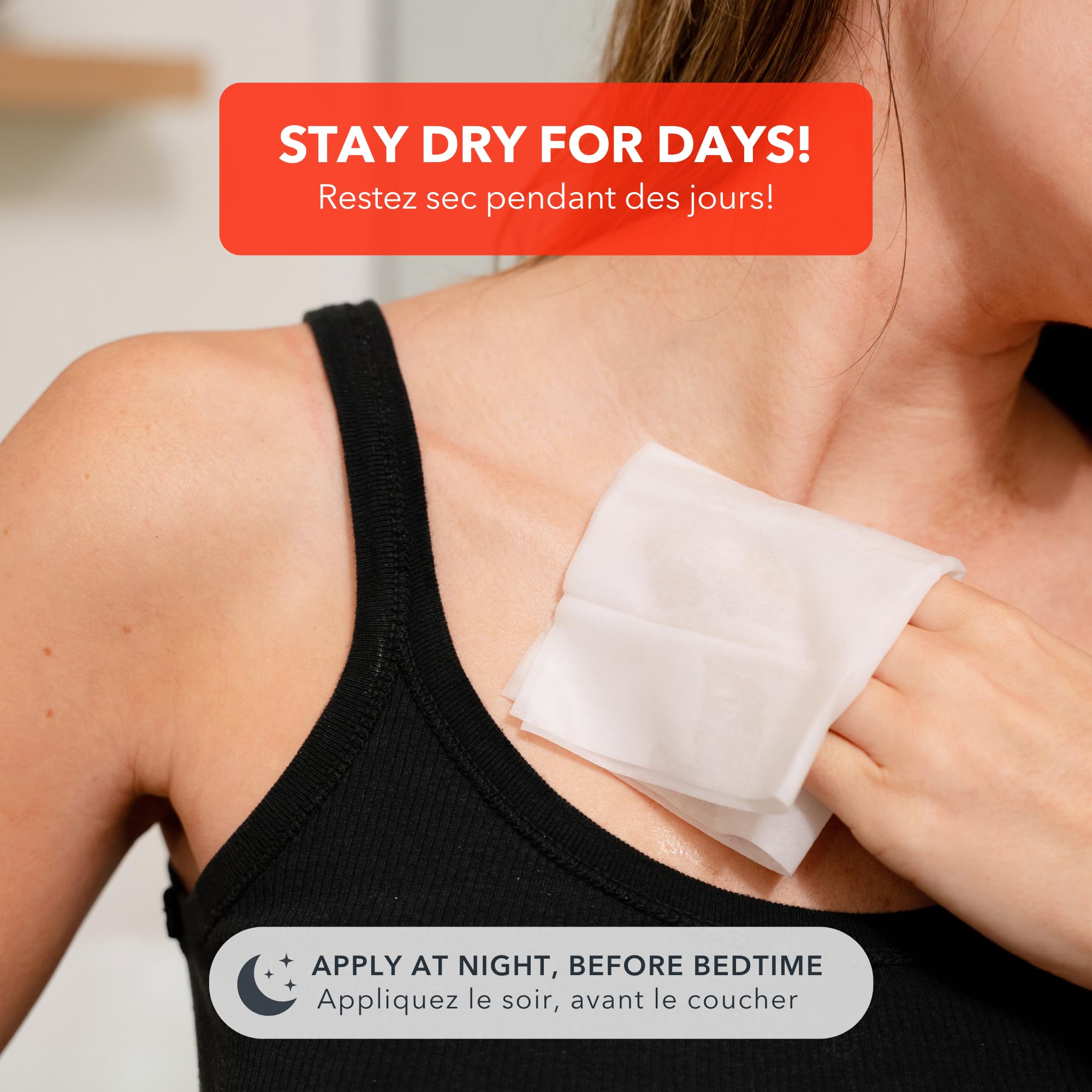 Hand applying SweatBlock wipe promotes dryness and comfortable everyday activity.