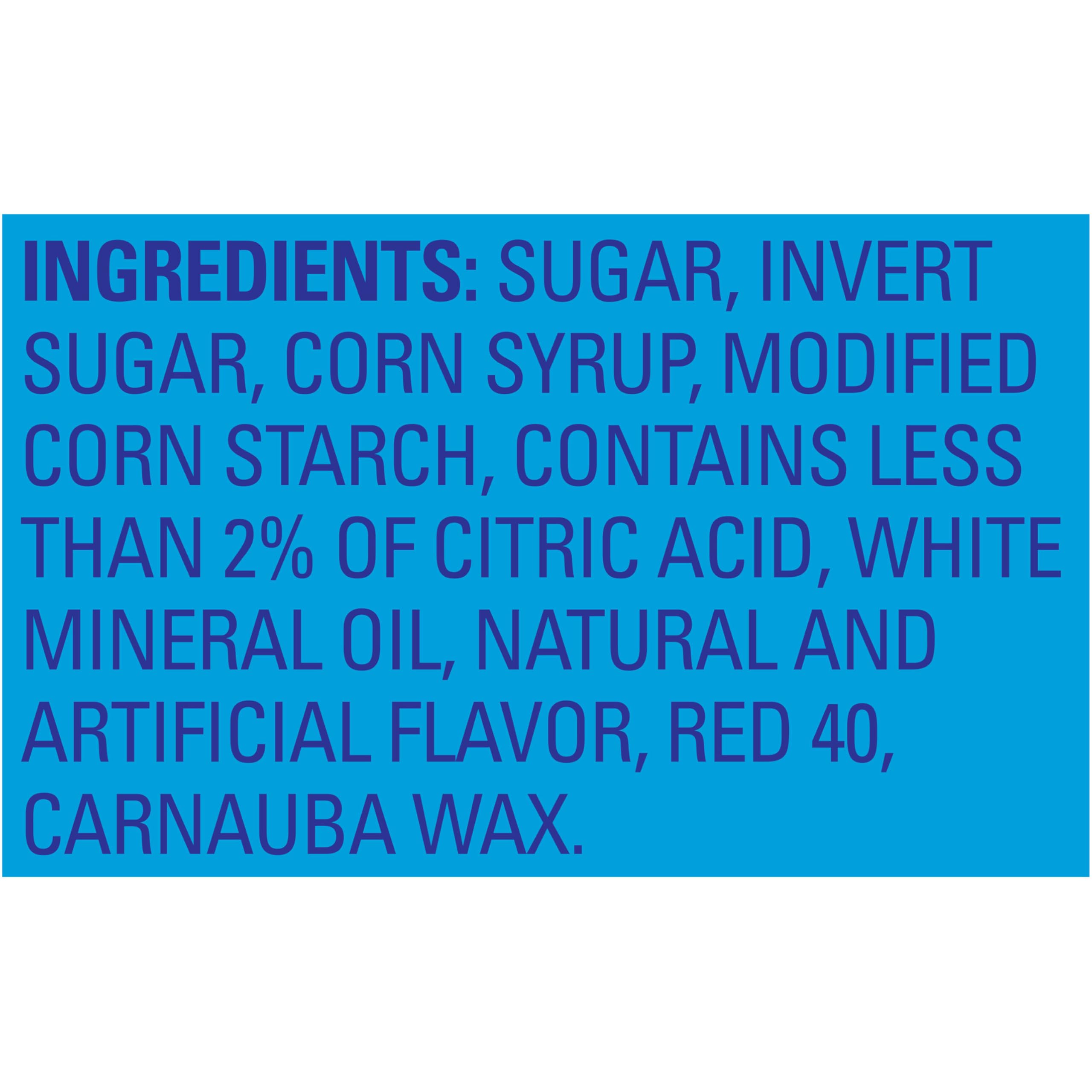 Close-up of Swedish Fish gummy piece highlighting soft, chewy texture and fruity flavor.