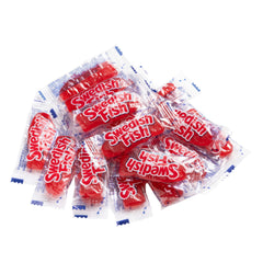 Fish-shaped gummy from Swedish Fish emphasizing playful design and bite-sized candy.