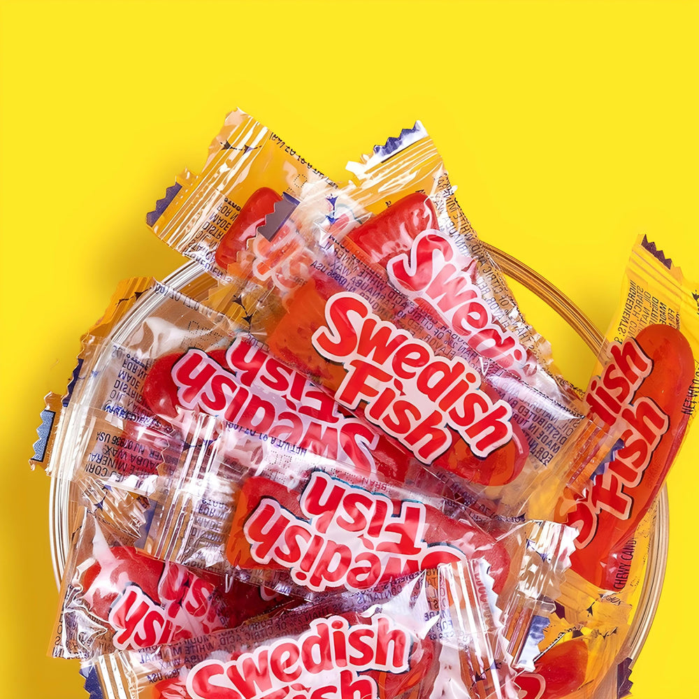 Flavor varieties of Swedish Fish close-up showcasing fruity options.