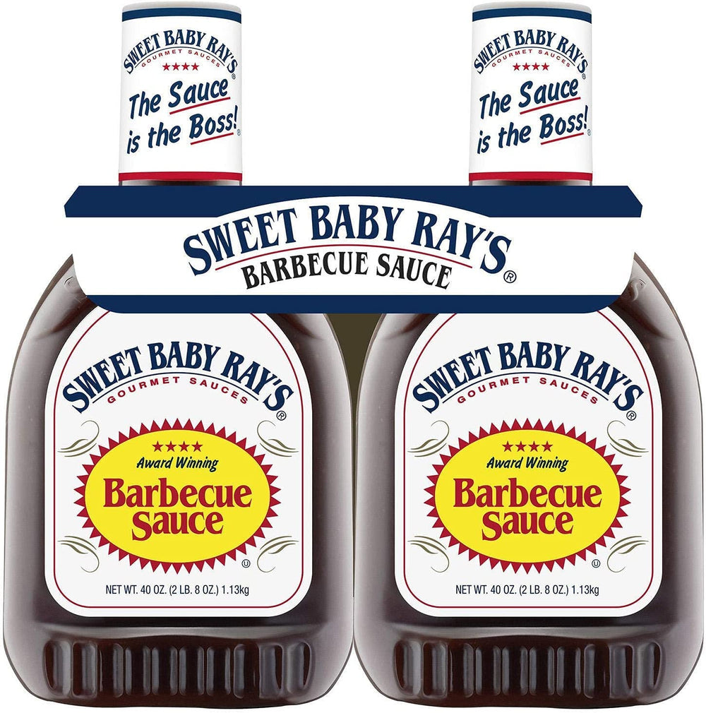 Sweet Baby Ray's barbecue sauce 40 oz bottle two-pack being poured for grilling.