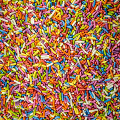 Sweet Eva’s Rainbow Sprinkles on ice cream spark festive, kid-friendly toppings.