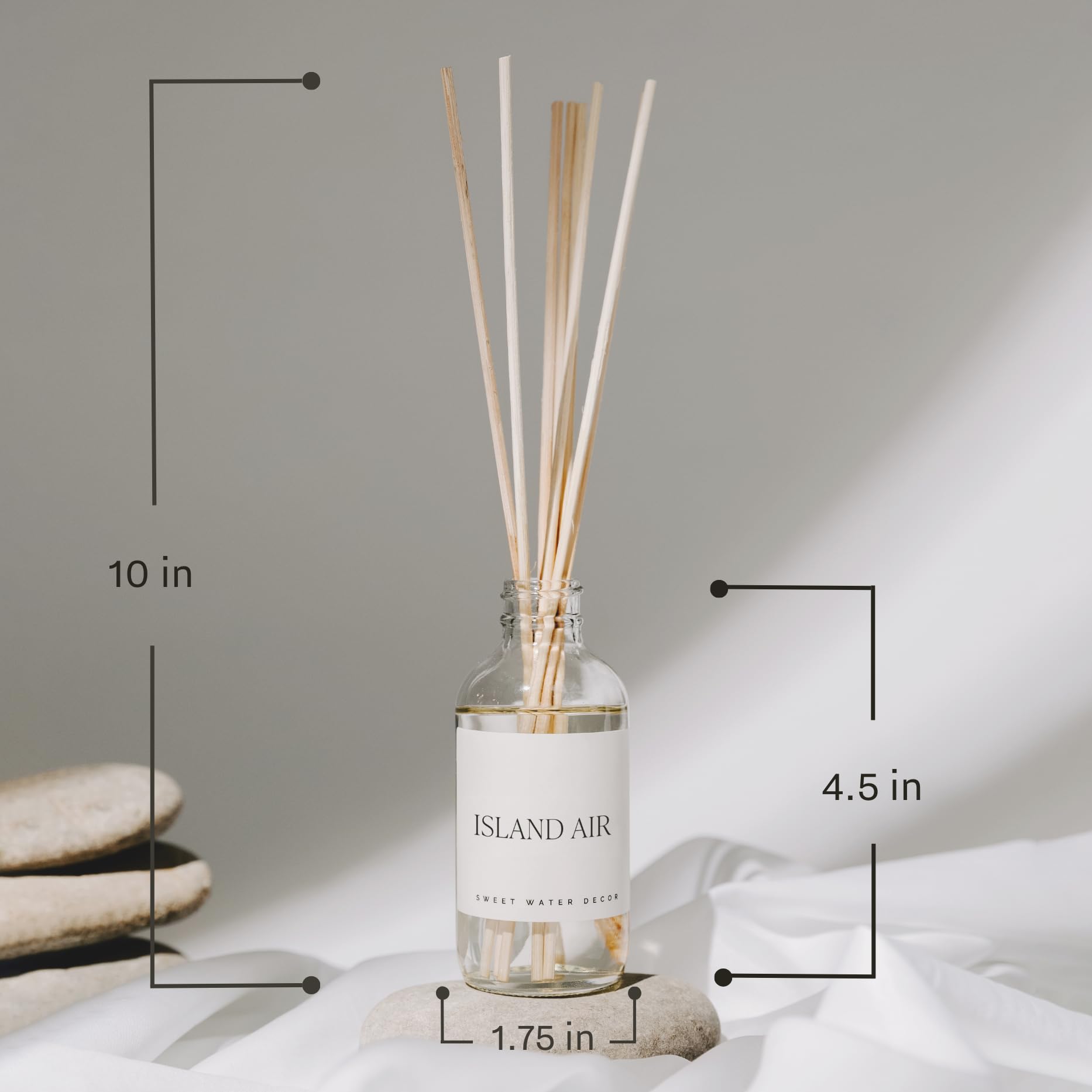Sweet Water Decor bathroom diffuser on sink creating spa-like ambiance.