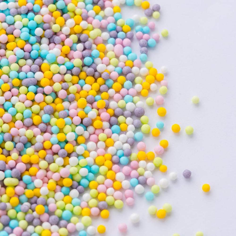 Sweets Indeed pastel sprinkles decorate cakes with even coverage and color.