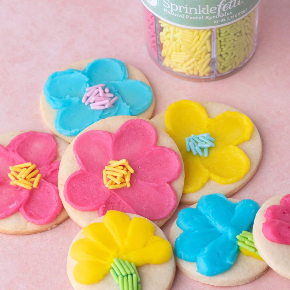 Sweets Indeed heart-confetti highlights playful toppers for birthday treats.