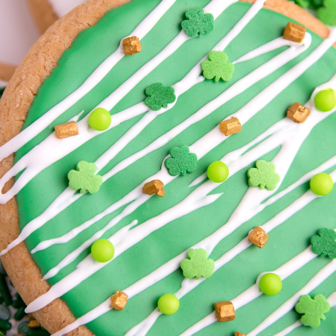 Sweets Indeed clover green quins decorate donuts with Patrick's Day charm.