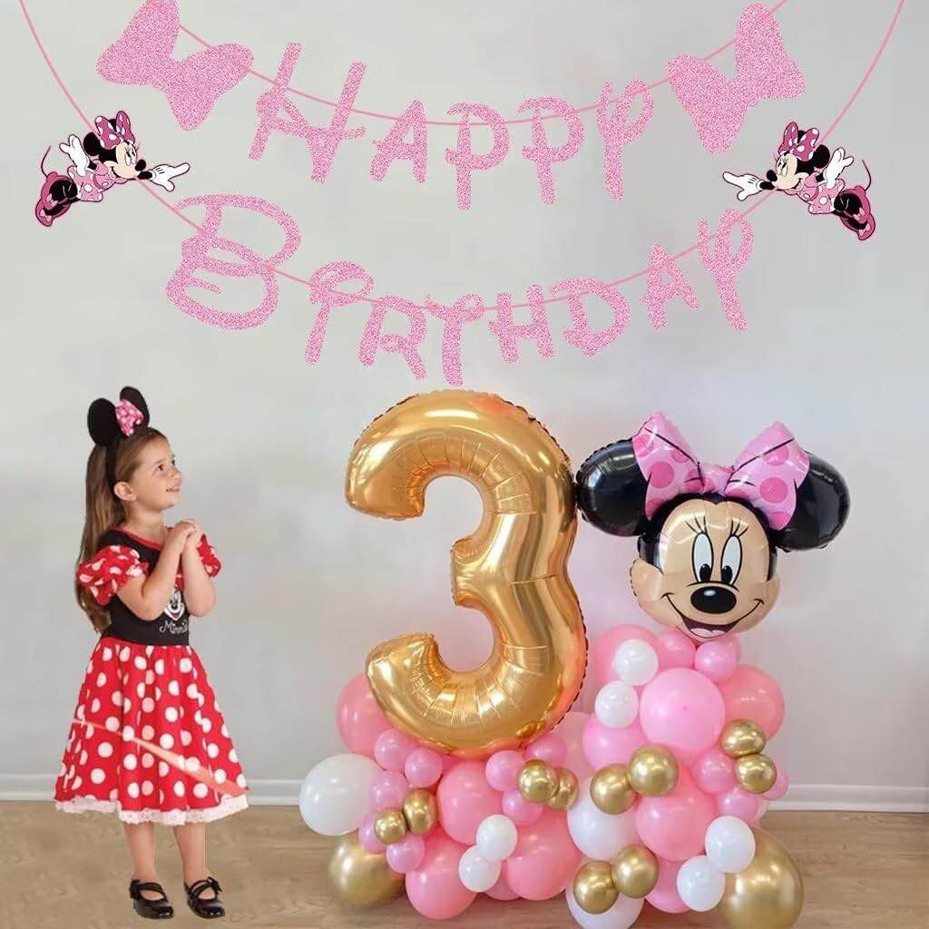Swiftion pink mouse banner paired with other decorations to create a cohesive party theme.
