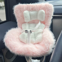 SwiftServ pink doll car-seat shows a cushioned perch for tiny figures.