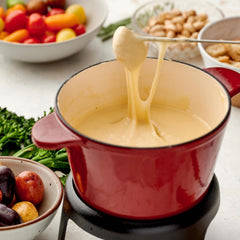 Bread dippers arranged beside the fondue pot for easy entertaining.