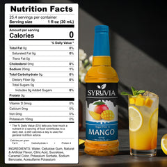 SYRUVIA mango syrup bottle pouring into a glass for bold flavor.