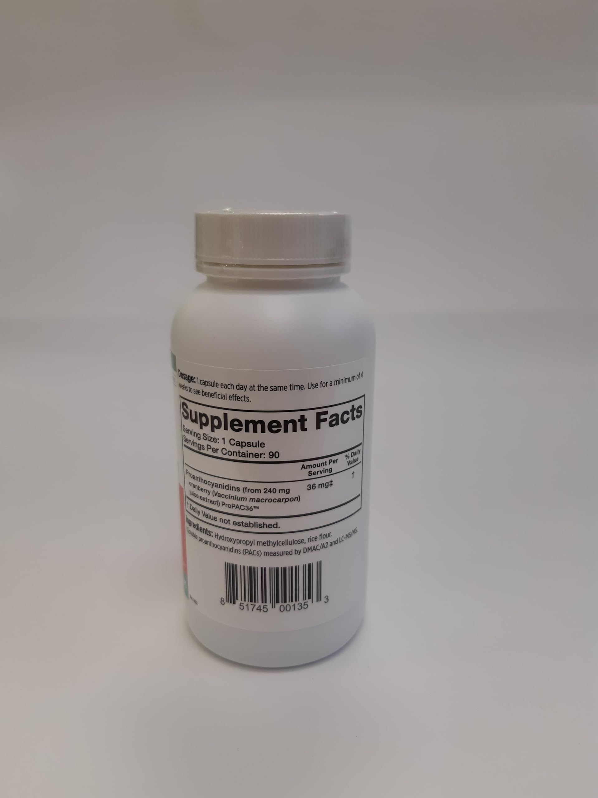 Szio+ Utiva Cranberry PACs capsule close-up showing small one a day size