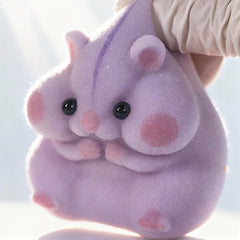 Taba squishy hamster toy handheld size ideal for desk fidgeting.