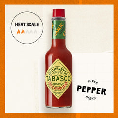 TABASCO Cayenne Garlic Pepper Sauce being poured to boost marinara and dips.