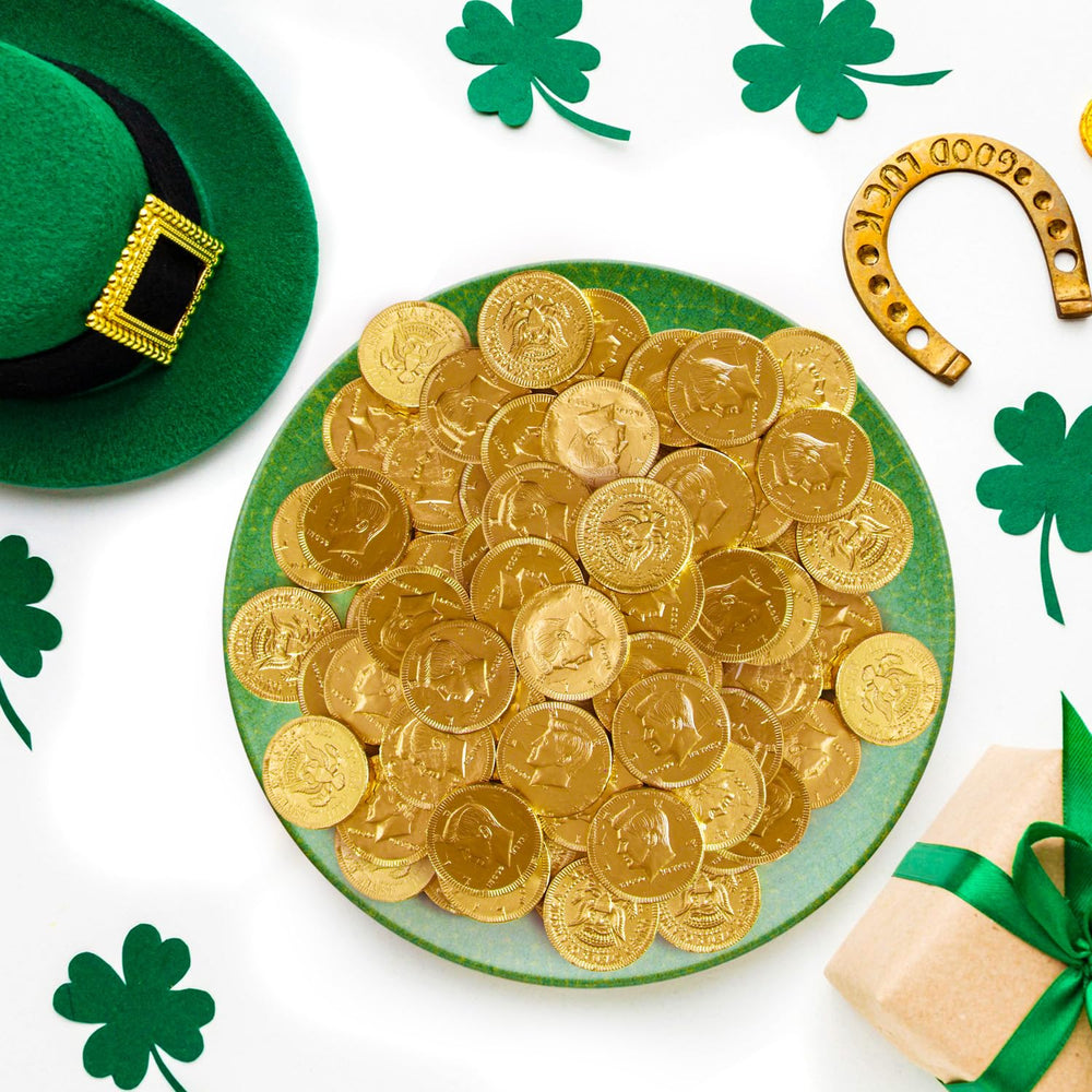 Taboom gift bags or party trays accented with shiny gold chocolate coins.