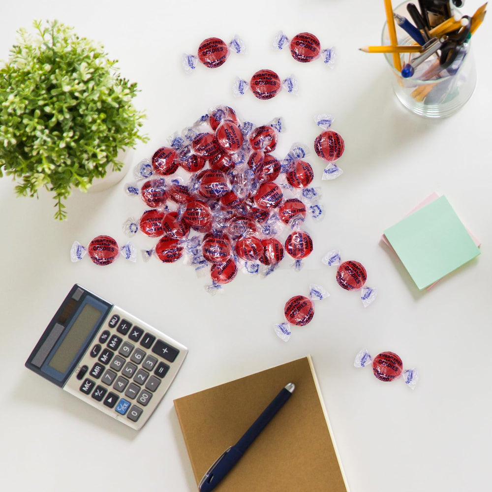 Taboom sugar-free discs in hand for on-the-go snacking.