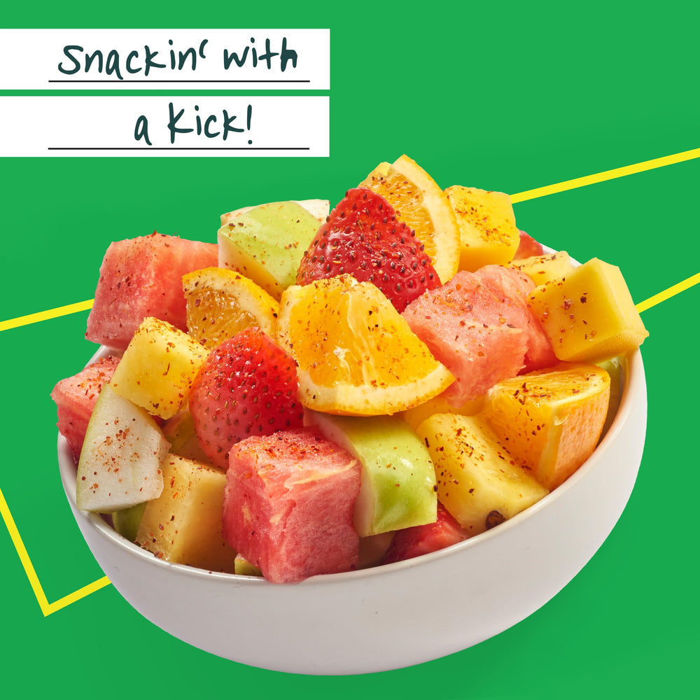 Tajín Clásico sprinkled on tacos or meats for enhanced flavor.