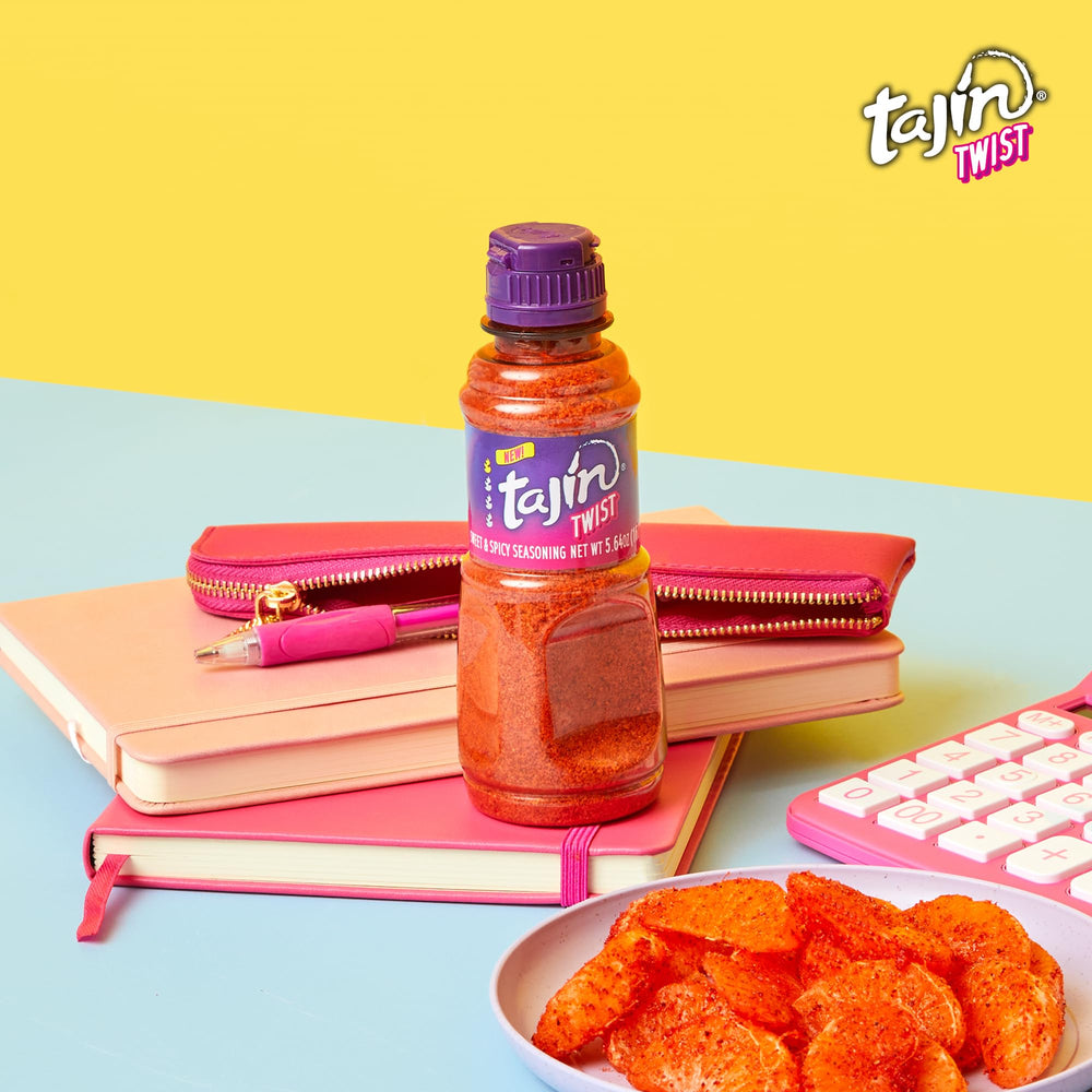Tajín Twist sprinkled on a snack platter for vibrant flavor.