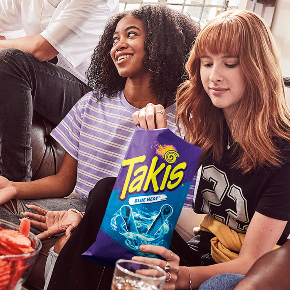 Takis Blue Heat spice dust close-up suggests intense flavor potential