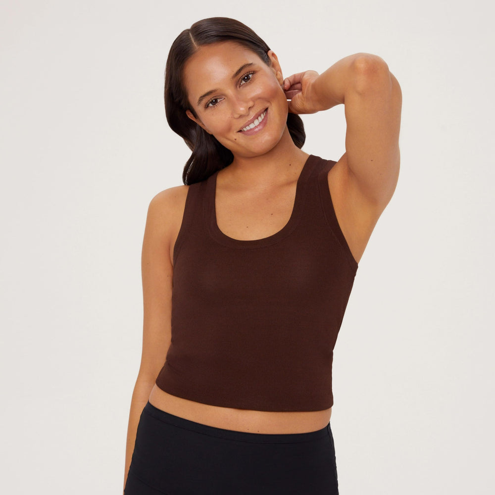 Tan-Luxe The Body vegan cruelty-free packaging logo signals ethics.