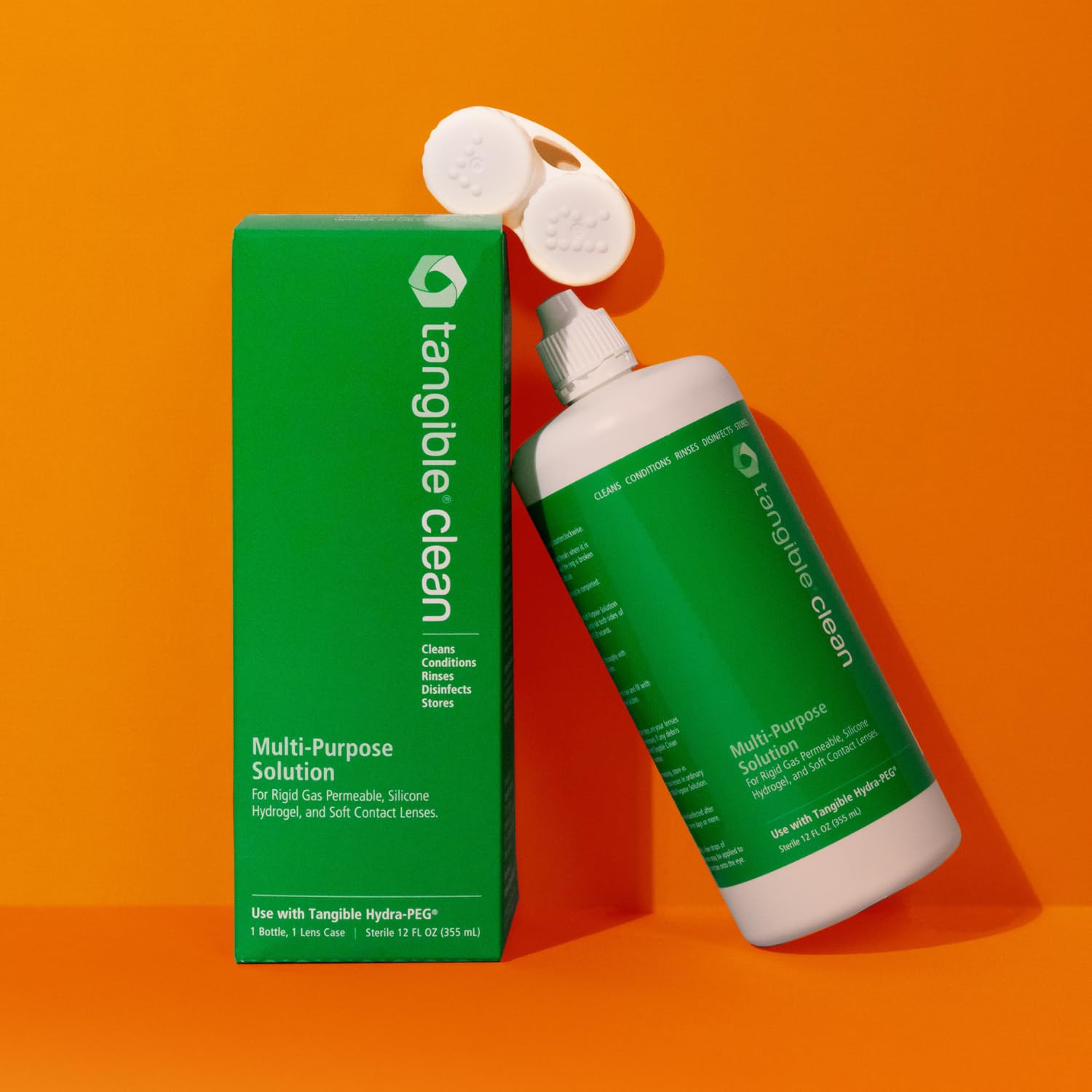 Tangible Clean bottle label highlights compatibility with all lenses