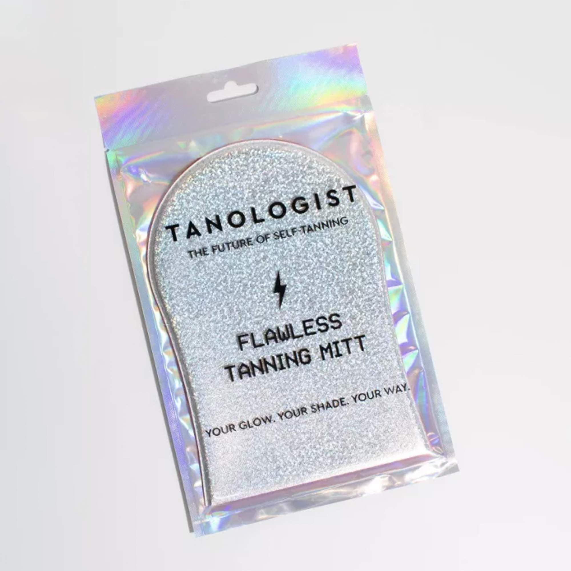 Tanologist Flawless Tanning Mitt being washed to show reusable and durable care.