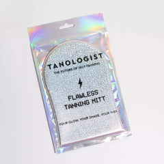 Tanologist Flawless Tanning Mitt being washed to show reusable and durable care.