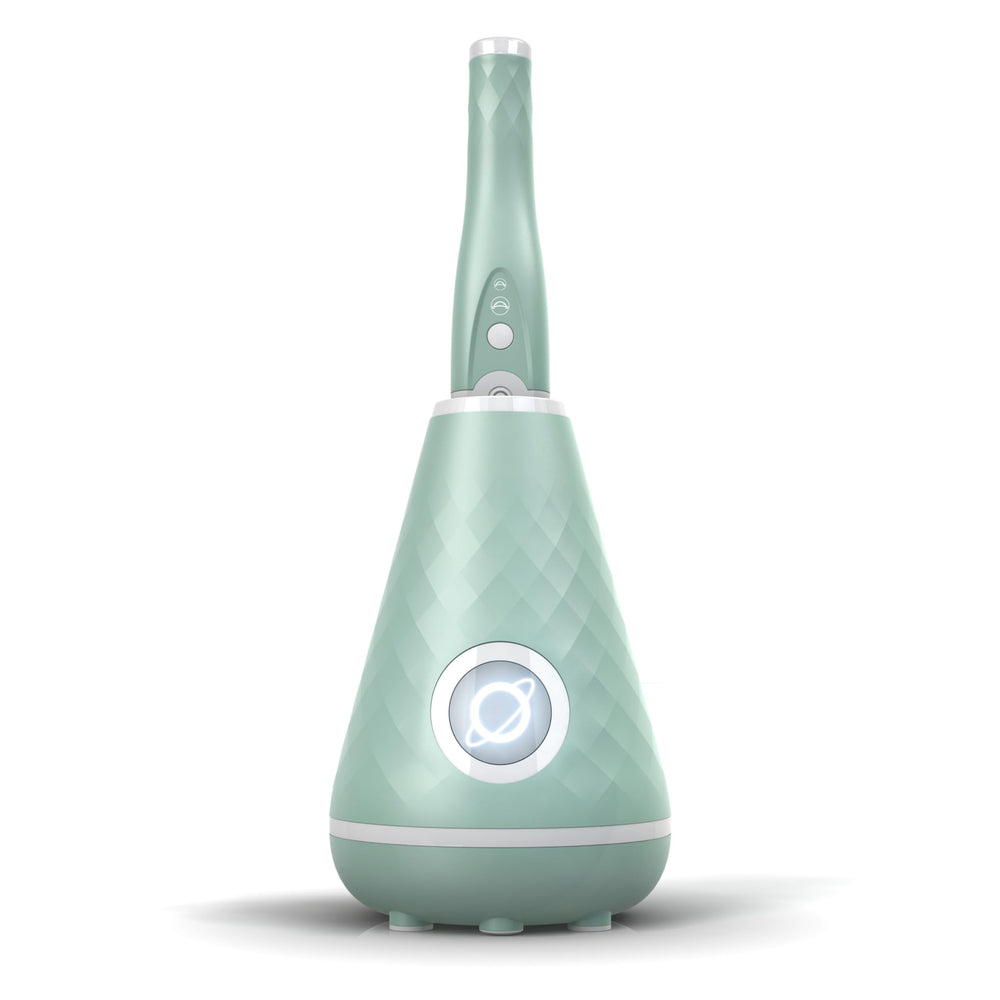 Tao Clean seaglass-green sonic toothbrush ready for daily use.