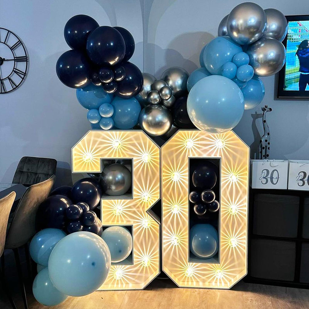 TAOYE chrome blue balloons create bold focal points for celebrations.