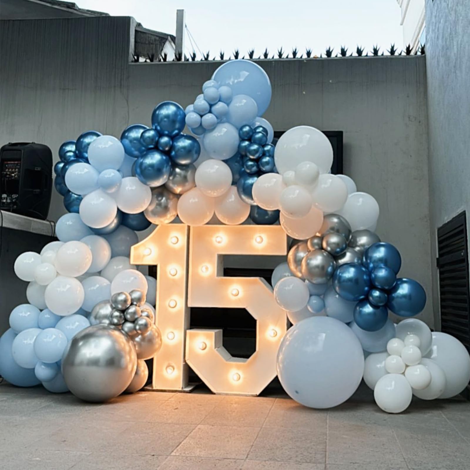 TAOYE silver confetti balloons shimmer with festive texture for joyful decor.